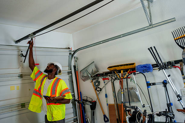 Professional Garage Door Panel Replacement technician working in Sanborn, IA
